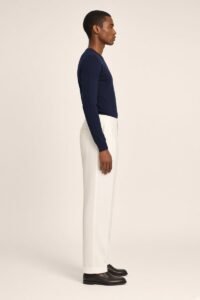 ASSANE, straight-leg trousers worn, side view