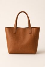 SWIRA · Cabas cognac — vue de face, fond nacre
