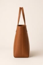 SWIRA · Cabas cognac — vue de profil, fond nacre